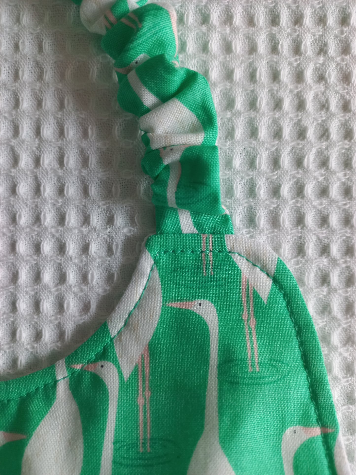 Bavoir à élastique