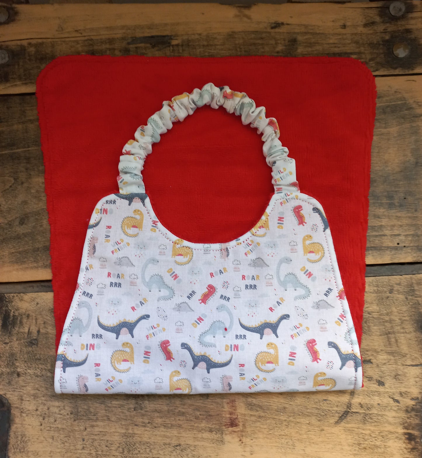 Bavoir à élastique