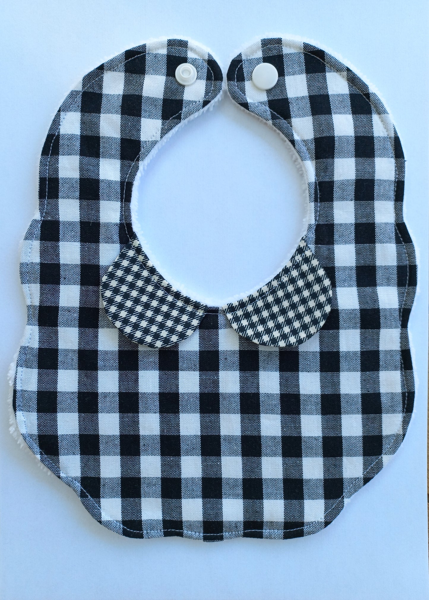 Bavoir 1er âge vichy blanc / noir