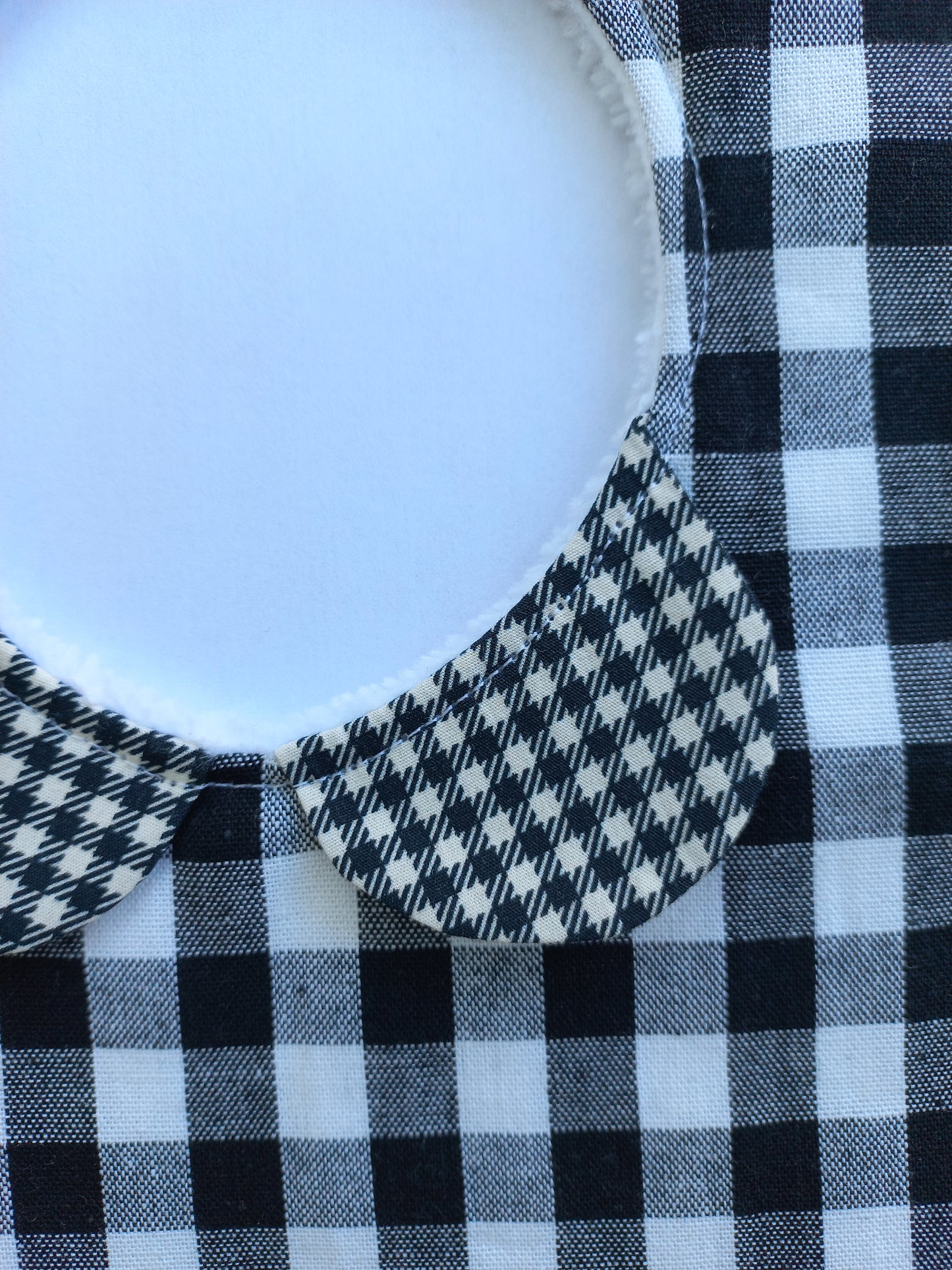 Bavoir 1er âge vichy blanc / noir